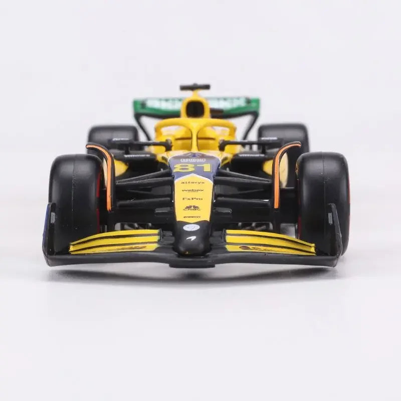 Bburago 1:43 McLaren Monaco Grand Prix diecast model featuring #4 Lando Norris and #81 Daniel Ricciardo, 2024 F1 collectible.