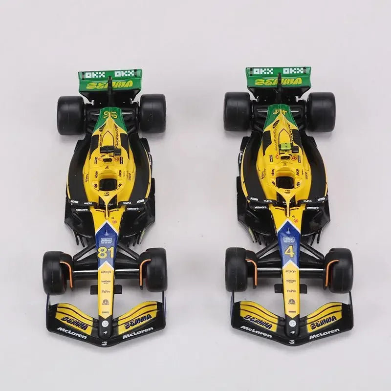 Bburago 1:43 McLaren Monaco Grand Prix diecast model featuring #4 Lando Norris and #81 Daniel Ricciardo, 2024 F1 collectible.