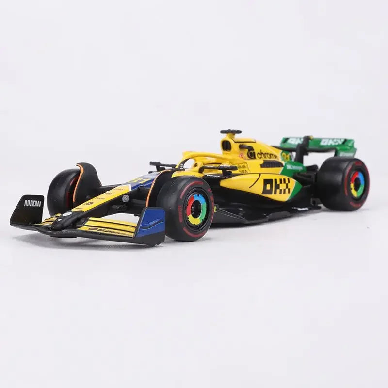 Bburago 1:43 McLaren Monaco Grand Prix diecast model featuring #4 Lando Norris and #81 Daniel Ricciardo, 2024 F1 collectible.