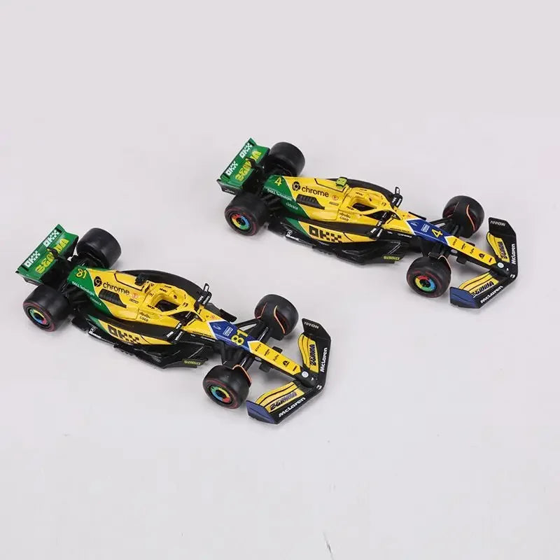 Bburago 1:43 McLaren Monaco Grand Prix diecast model featuring #4 Lando Norris and #81 Daniel Ricciardo, 2024 F1 collectible.