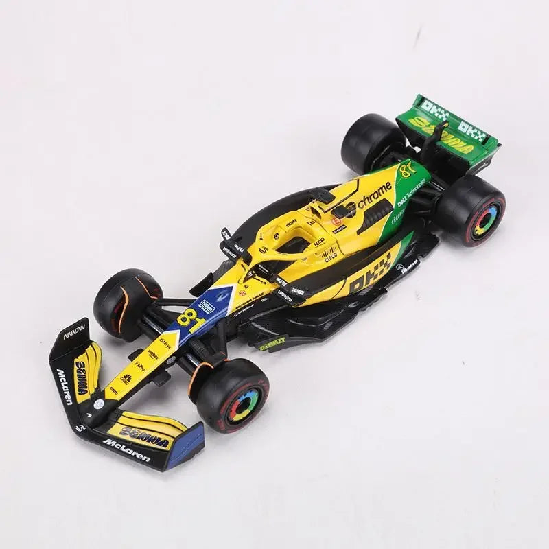 Bburago 1:43 McLaren Monaco Grand Prix diecast model featuring #4 Lando Norris and #81 Daniel Ricciardo, 2024 F1 collectible.