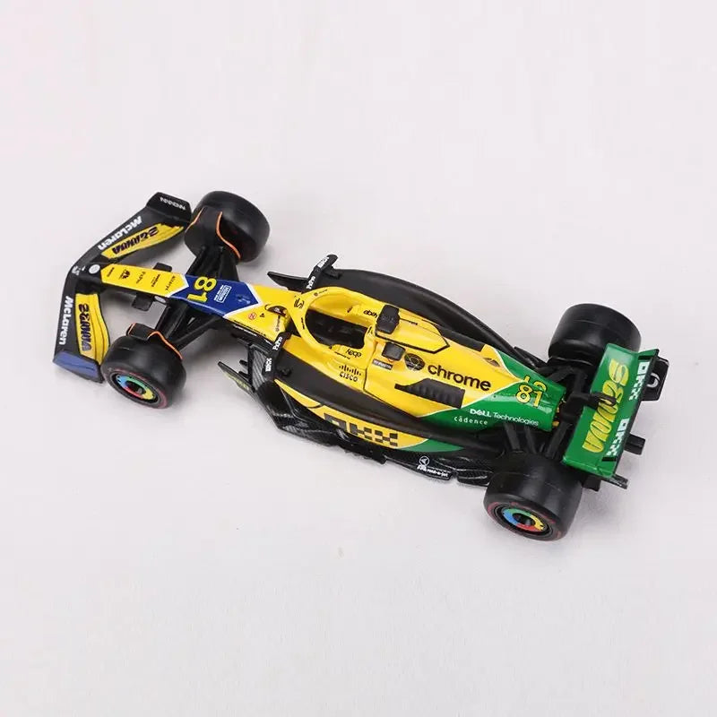 Bburago 1:43 McLaren Monaco Grand Prix diecast model featuring #4 Lando Norris and #81 Daniel Ricciardo, 2024 F1 collectible.