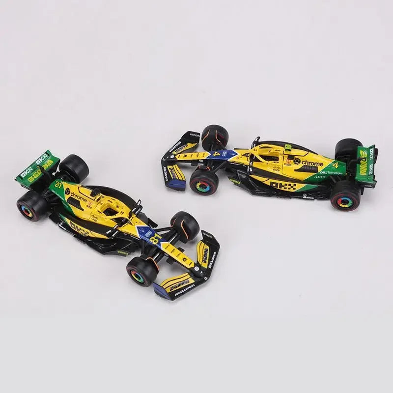 Bburago 1:43 McLaren Monaco Grand Prix diecast model featuring #4 Lando Norris and #81 Daniel Ricciardo, 2024 F1 collectible.