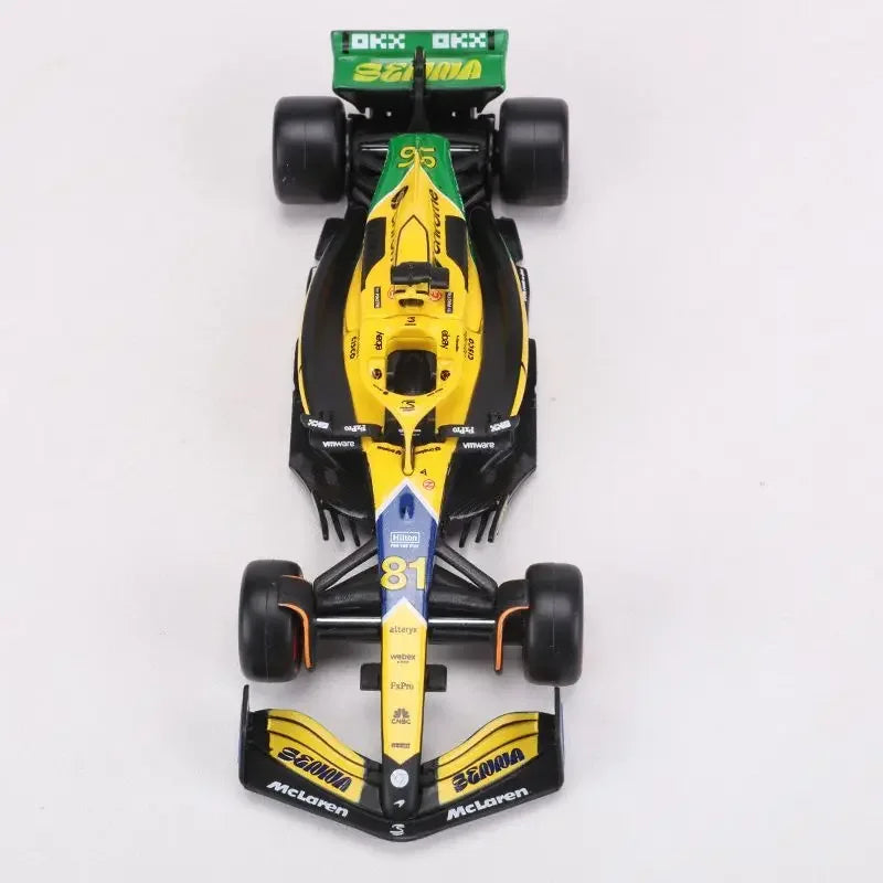 Bburago 1:43 McLaren Monaco Grand Prix diecast model featuring #4 Lando Norris and #81 Daniel Ricciardo, 2024 F1 collectible.